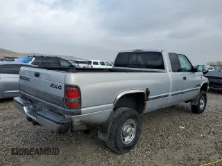 1999 Dodge Ram 2500 with VIN 1B7KF2360XJ650261, listed as a Copart auction lot 85682364 with 203,719 mi miles and Salvage Title. Bid and sale history available at carsss.com. Image 3.