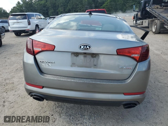 2013 Kia Optima EX с VIN 5XXGN4A77DG213051, выставлен на аукционе Copart как лот 58849865 с пробегом Не указан миль и Списание • Salvage title. История ставок и продаж доступна на DreamBid. Изображение 6.