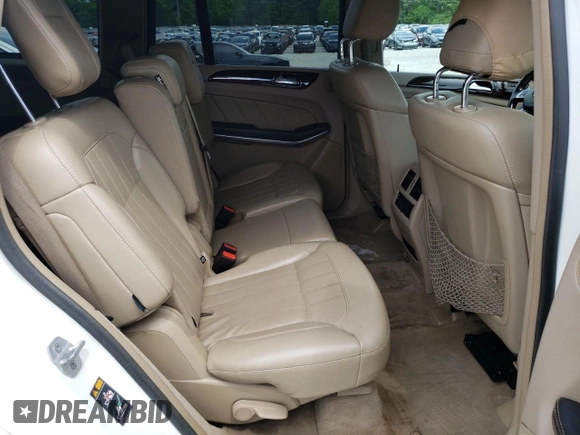 2013 Mercedes-Benz GL 450 z VIN 4JGDF7CE5DA249440, wystawiony jako Copart lot #57466825 z przebiegiem 120 163 mil mil oraz Tytuł czysty. Historia ofert i sprzedaży dostępna na DreamBid. Obrazek 11.