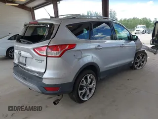 2013 Ford Escape Titanium с VIN 1FMCU9J98DUB24112, выставлен на аукционе IAAI как лот 42338121 с пробегом 162 786 миль миль и . История ставок и продаж доступна на DreamBid. Изображение 4.