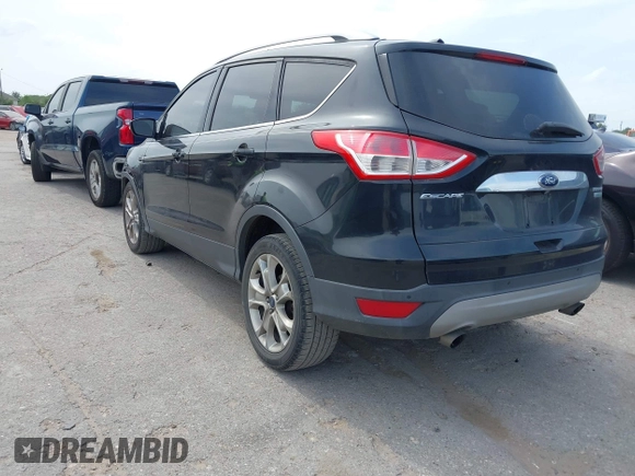 2014 Ford Escape Titanium with VIN 1FMCU0JX5EUB43194, listed as a IAAI auction lot 42084883 with 71,819 mi miles. Bid and sale history available at carsss.com. Image 3.
