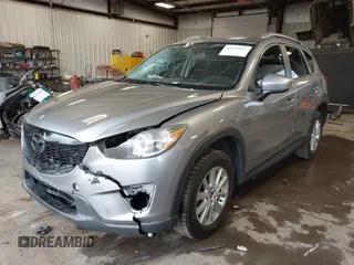 2015 Mazda CX-5 Sport z VIN JM3KE2BE8F0434889, wystawiony jako IAAI lot #42259894 z przebiegiem 298 835 mil mil oraz . Historia ofert i sprzedaży dostępna na DreamBid. Obrazek 2.