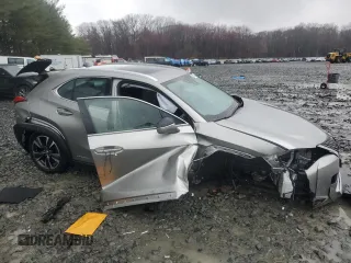 2021 Lexus UX with VIN JTHP9JBH1M2039301, listed as a Copart auction lot 50186785 with 32,242 mi miles and Salvage Title. Bid and sale history available at carsss.com. Image 4.