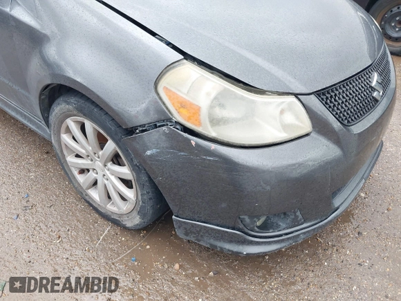 2012 Suzuki SX4 with VIN JS2YC5A55C6300349, listed as a IAAI auction lot 41472004 with 178,487 mi miles and . Bid and sale history available at DreamBid. Image 6.