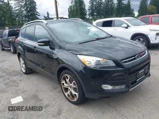 2013 Ford Escape Titanium with VIN 1FMCU9J98DUB02238, listed as a IAAI auction lot 42609782 with 168,574 mi miles and . Bid and sale history available at DreamBid. Image 1.