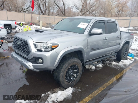 2021 Toyota Tacoma SR z VIN 3TMCZ5AN0MM386867, wystawiony jako IAAI lot #41580426 z przebiegiem 46 559 mil mil oraz . Historia ofert i sprzedaży dostępna na DreamBid. Obrazek 19.