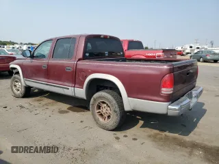 2000 Dodge Dakota Sport with VIN 1B7GG2AN1YS699073, listed as a Copart auction lot 70782284 with 141,876 mi miles and Salvage Title. Bid and sale history available at carsss.com. Image 2.
