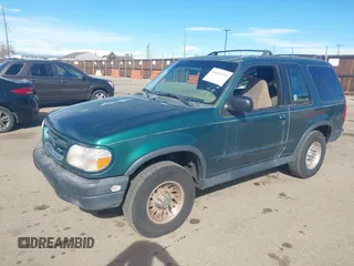 1999 Ford Explorer Sport with VIN 1FMYU22X2XUB19728, listed as a IAAI auction lot 41642358 with 128,788 mi miles and . Bid and sale history available at DreamBid. Image 2.