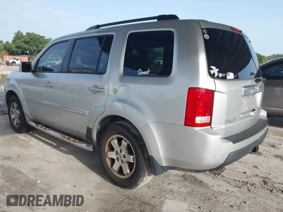 2009 Honda Pilot Touring z VIN 5FNYF38839B022943, wystawiony jako IAAI lot #42443006 z przebiegiem 199 184 mil mil oraz . Historia ofert i sprzedaży dostępna na DreamBid. Obrazek 3.