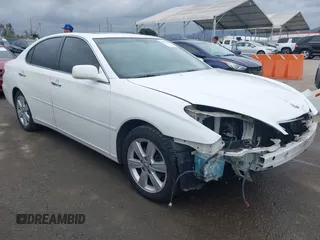 2005 Lexus ES 330 with VIN JTHBA30G055084186, listed as a IAAI auction lot 42064508 with 154,736 mi miles. Bid and sale history available at carsss.com. Image 1.