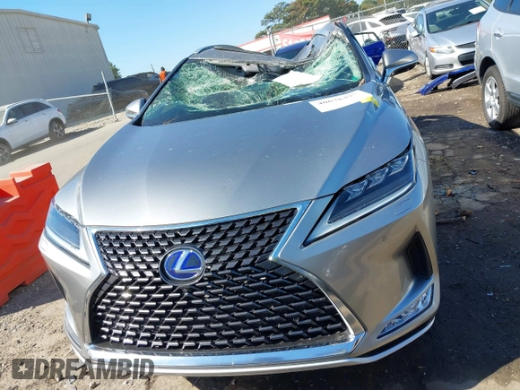 2020 Lexus RX with VIN JTJJGKFA7L2013877, listed as a IAAI auction lot 40678497 with 67,271 mi miles. Bid and sale history available at carsss.com. Image 12.