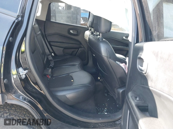2019 Jeep Compass Latitude with VIN 3C4NJDBB1KT648185, listed as a IAAI auction lot 41622077 with 74,072 mi miles and . Bid and sale history available at DreamBid. Image 8.