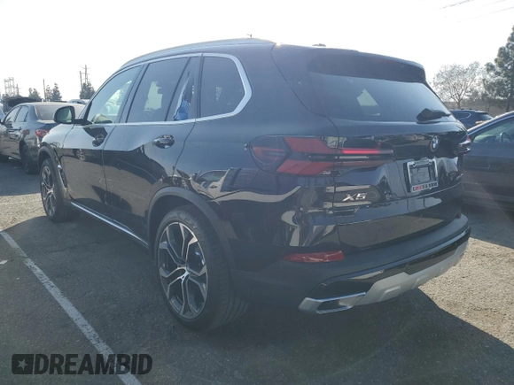 2025 BMW X5 sDrive40i with VIN 5UX13EU09S9Y23879, listed as a Copart auction lot 43774515 with 210 mi miles and Salvage Title. Bid and sale history available at carsss.com. Image 2.