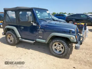 2000 Jeep Wrangler Sport with VIN 1J4FA49S9YP742414, listed as a Copart auction lot 61471065 with 139,572 mi miles and Clean title. Bid and sale history available at DreamBid. Image 4.