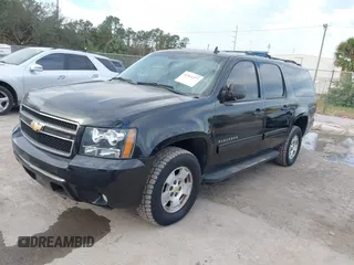 2010 Chevrolet Suburban LS with VIN 1GNUKHE38AR190423, listed as a IAAI auction lot 41655080 with 215,187 mi miles and . Bid and sale history available at DreamBid. Image 2.