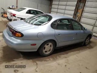 1997 Ford Taurus GL z VIN 1FALP52U9VG137092, wystawiony jako Copart lot #53430495 z przebiegiem 47 987 mil mil oraz Szkoda całkowita • Salvage title. Historia ofert i sprzedaży dostępna na DreamBid. Obrazek 3.