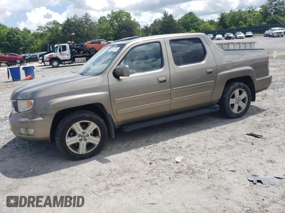 2011 Honda Ridgeline RTL with VIN 5FPYK1F59BB007045, listed as a Copart auction lot 61263715 with 159,527 mi miles and Clean title. Bid and sale history available at DreamBid. Image 1.