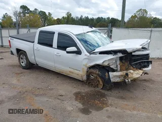 2018 Chevrolet Silverado 1500 LT with VIN 3GCUKREC3JG375591, listed as a IAAI auction lot 40887974 with 72,453 mi miles. Bid and sale history available at carsss.com. Image 1.