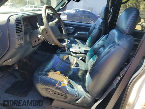 1997 GMC Yukon with VIN 1GKEK13R0VJ747359, listed as a Copart auction lot 48301095 with 272,417 mi miles and Salvage Title. Bid and sale history available at carsss.com. Image 7.