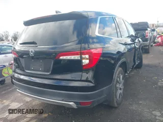 2019 Honda Pilot EX-L with VIN 5FNYF5H51KB013763, listed as a IAAI auction lot 41711089 with 79,651 mi miles and . Bid and sale history available at DreamBid. Image 4.