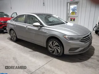 2020 Volkswagen Jetta SEL z VIN 3VWE57BU0LM087350, wystawiony jako IAAI lot #41581637 z przebiegiem 60 528 mil mil oraz . Historia ofert i sprzedaży dostępna na DreamBid. Obrazek 1.