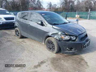 2014 Chevrolet Sonic LT with VIN 1G1JC6SG6E4121407, listed as a IAAI auction lot 41671918 with 137,517 mi miles. Bid and sale history available at carsss.com. Image 1.