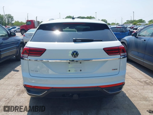 2022 Volkswagen Atlas SE z VIN 1V2HE2CA5NC225233, wystawiony jako IAAI lot #42366811 z przebiegiem 27 986 mil mil oraz . Historia ofert i sprzedaży dostępna na DreamBid. Obrazek 17.