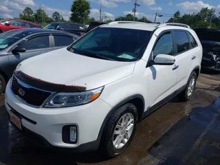 2015 Kia Sorento LX with VIN 5XYKTDA6XFG551064, listed as a IAAI auction lot 42536365 with 166,050 mi miles and . Bid and sale history available at DreamBid. Image 2.