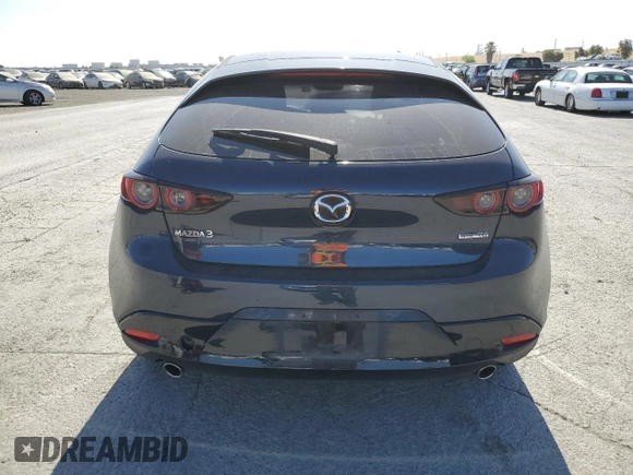 2020 Mazda 3 with VIN JM1BPALM9L1159882, listed as a Copart auction lot 61765925 with 59,494 mi miles and Salvage title. Bid and sale history available at DreamBid. Image 6.