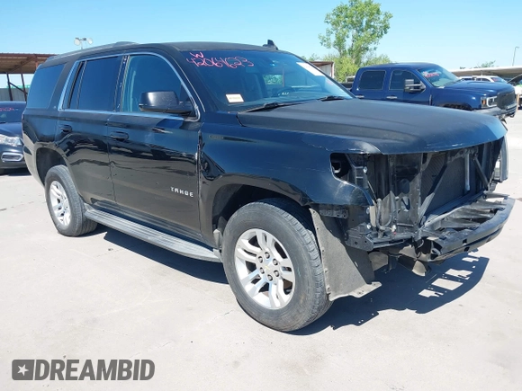2015 Chevrolet Tahoe LS with VIN 1GNSCAKC5FR645736, listed as a IAAI auction lot 42064623 with 223,149 mi miles and . Bid and sale history available at DreamBid. Image 1.