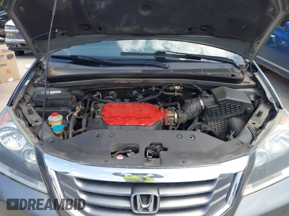 2010 Honda Odyssey Touring with VIN 5FNRL3H90AB053710, listed as a IAAI auction lot 42577646 with 255,351 mi miles and . Bid and sale history available at DreamBid. Image 10.