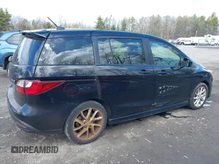 2012 Mazda 5 Touring with VIN JM1CW2CL8C0111574, listed as a IAAI auction lot 41999112 with 126,963 mi miles and . Bid and sale history available at DreamBid. Image 6.