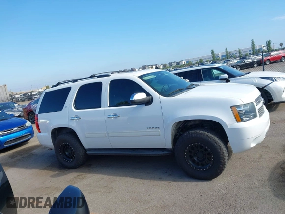 2011 Chevrolet Tahoe LT with VIN 1GNSCBE0XBR374156, listed as a IAAI auction lot 42659337 with 201,514 mi miles and . Bid and sale history available at DreamBid. Image 13.