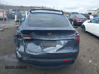 2023 Tesla Model Y Long Range with VIN 7SAYGDEE8PF599254, listed as a IAAI auction lot 41718342 with 24,339 mi miles and . Bid and sale history available at carsss.com. Image 17.