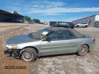 2005 Chrysler Sebring Touring z VIN 1C3EL55R25N567343, wystawiony jako IAAI lot #42447317 z przebiegiem Nie podano mil oraz . Historia ofert i sprzedaży dostępna na DreamBid. Obrazek 13.