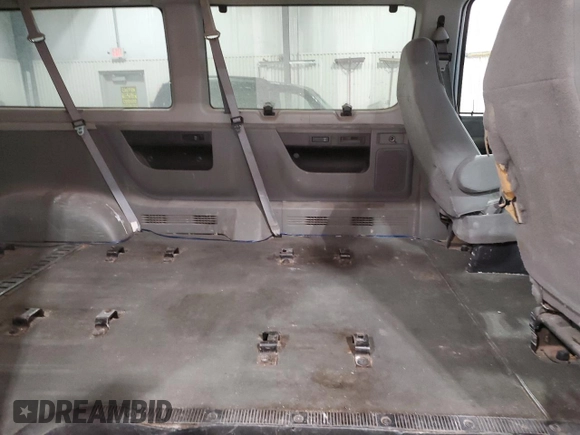 2004 Ford Econoline Passenger XL with VIN 1FBSS31S64HB07909, listed as a Copart auction lot 45110705 with 263,824 mi miles and Salvage Title. Bid and sale history available at carsss.com. Image 11.