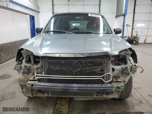 2004 Mazda Tribute ES with VIN 4F2CZ96174KM09789, listed as a Copart auction lot 48874035 with 312,510 mi miles and Salvage Title. Bid and sale history available at carsss.com. Image 5.