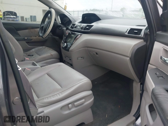 2014 Honda Odyssey Touring with VIN 5FNRL5H98EB008953, listed as a IAAI auction lot 42291179 with Not provided miles and . Bid and sale history available at DreamBid. Image 5.