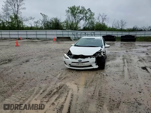 2014 Toyota Prius One z VIN JTDKDTB33E1558853, wystawiony jako Copart lot #57339425 z przebiegiem Nie podano mil oraz Nie do naprawy • Non repairable. Historia ofert i sprzedaży dostępna na DreamBid. Obrazek 13.