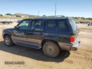 1997 Mercury Mountaineer z VIN 4M2DU52P5VUJ58731, wystawiony jako Copart lot #69710404 z przebiegiem 266 522 mil mil oraz Tytuł czysty. Historia ofert i sprzedaży dostępna na DreamBid. Obrazek 2.