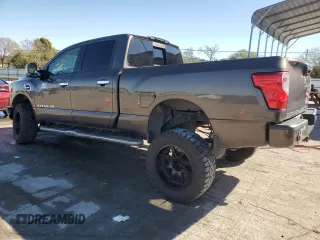2017 Nissan Titan XD SL with VIN 1N6BA1F27HN547900, listed as a Copart auction lot 76158824 with 148,067 mi miles and Salvage Title. Bid and sale history available at carsss.com. Image 2.