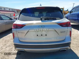2019 Infiniti QX50 LUXE with VIN 3PCAJ5M19KF144488, listed as a IAAI auction lot 41811631 with 99,640 mi miles. Bid and sale history available at carsss.com. Image 17.