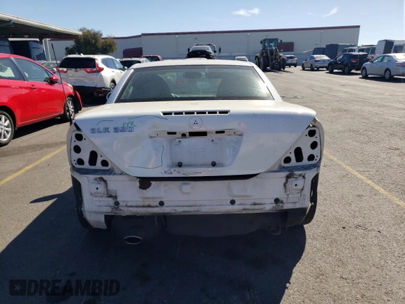 2001 Mercedes-Benz SLK 230/320 with VIN WDBKK65F41F235419, listed as a Copart auction lot 77407374 with 79,238 mi miles and Salvage Title. Bid and sale history available at DreamBid. Image 6.