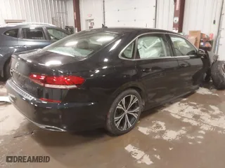 2021 Volkswagen Passat 2.0T SE with VIN 1VWSA7A30MC010553, listed as a IAAI auction lot 41581624 with 26,320 mi miles. Bid and sale history available at carsss.com. Image 4.
