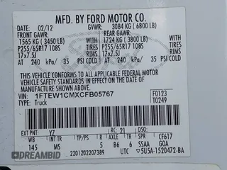 2012 Ford F-150 XL with VIN 1FTEW1CMXCFB05767, listed as a IAAI auction lot 41726889 with 302,191 mi miles. Bid and sale history available at carsss.com. Image 9.