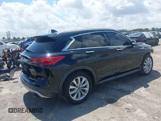 2019 Infiniti QX50 LUXE with VIN 3PCAJ5M16KF119709, listed as a IAAI auction lot 41922353 with 96,262 mi miles. Bid and sale history available at carsss.com. Image 4.