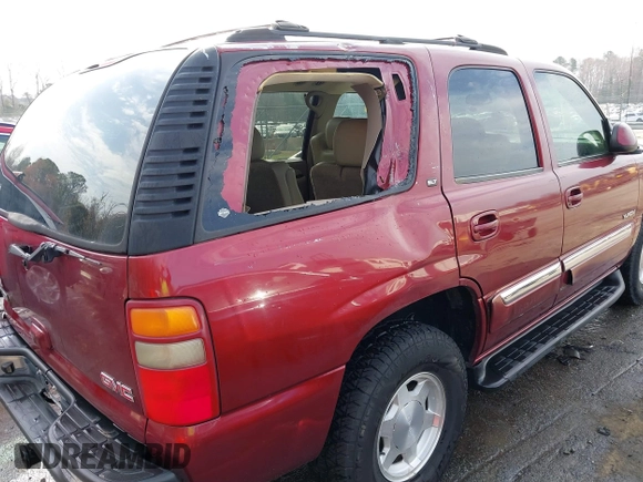 2003 GMC Yukon SLT with VIN 1GKEK13Z73R199374, listed as a IAAI auction lot 41840225 with 230,235 mi miles. Bid and sale history available at carsss.com. Image 6.