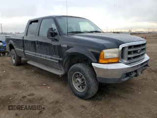 2000 Ford Super Duty F-250 XL with VIN 1FTNW21F6YEC98099, listed as a Copart auction lot 45403345 with 121,425 mi miles and Salvage Title. Bid and sale history available at carsss.com. Image 4.