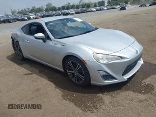 2013 Scion FR-S with VIN JF1ZNAA14D2714039, listed as a IAAI auction lot 42041189 with 167,685 mi miles. Bid and sale history available at carsss.com. Image 1.