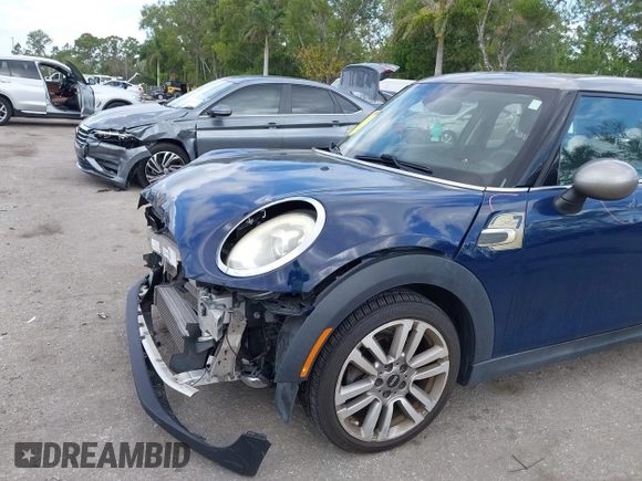 2017 MINI Hardtop 4 Door Cooper with VIN WMWXU1C54H2E19114, listed as a IAAI auction lot 42107266 with 83,524 mi miles and . Bid and sale history available at DreamBid. Image 6.
